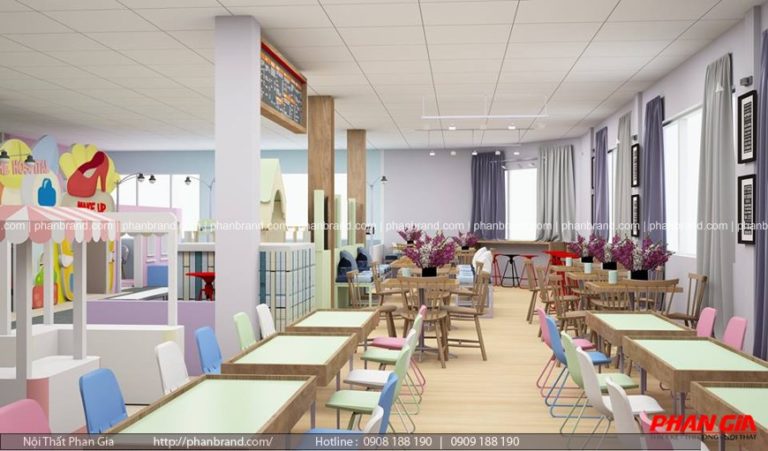 Khu vui chơi trẻ em trong nhà với dãy bàn ghế gỗ, ghế màu pastel và các ngôi nhà chơi nhỏ